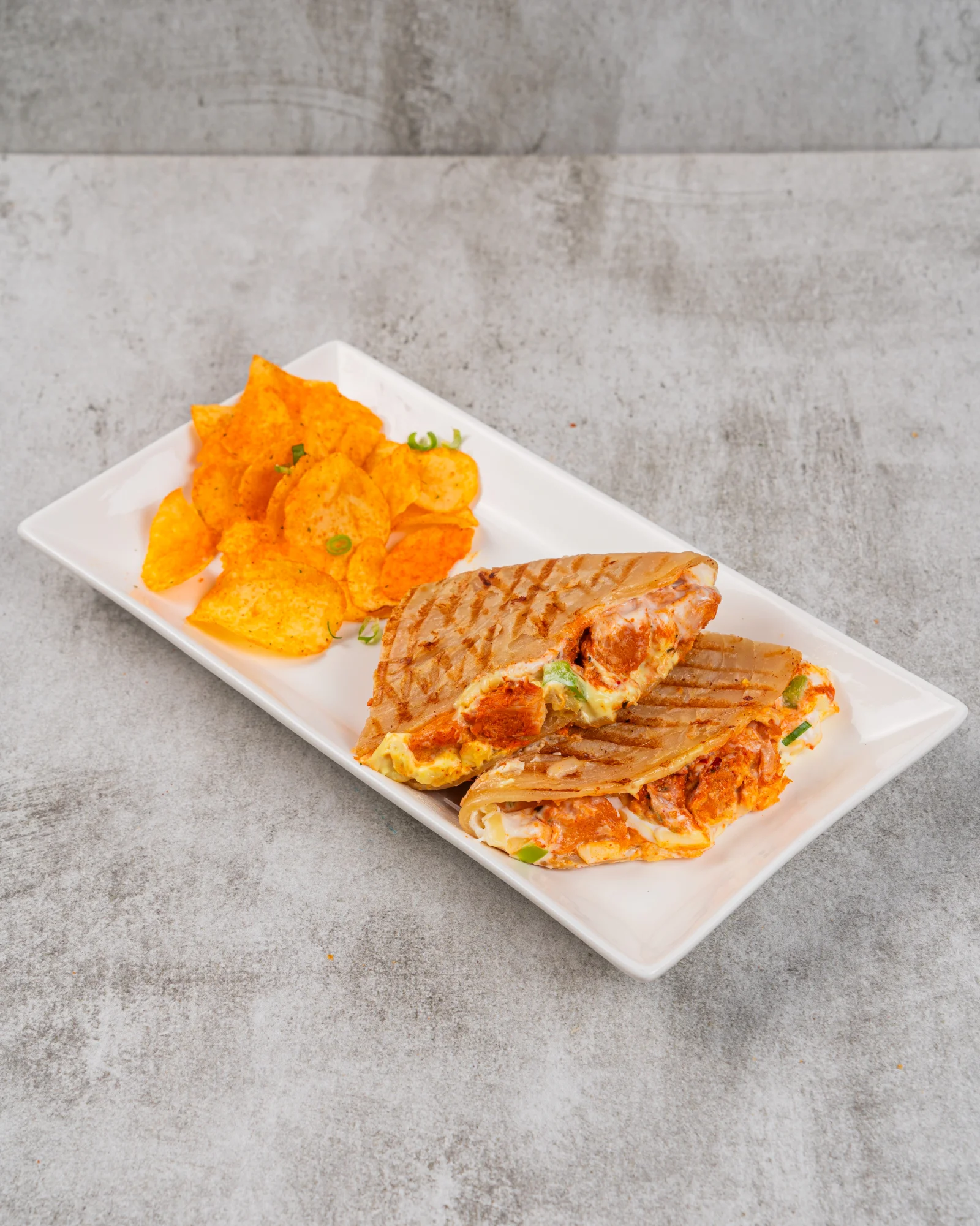 Chicken Tikka Lacha Melt - FiLLi Cafe