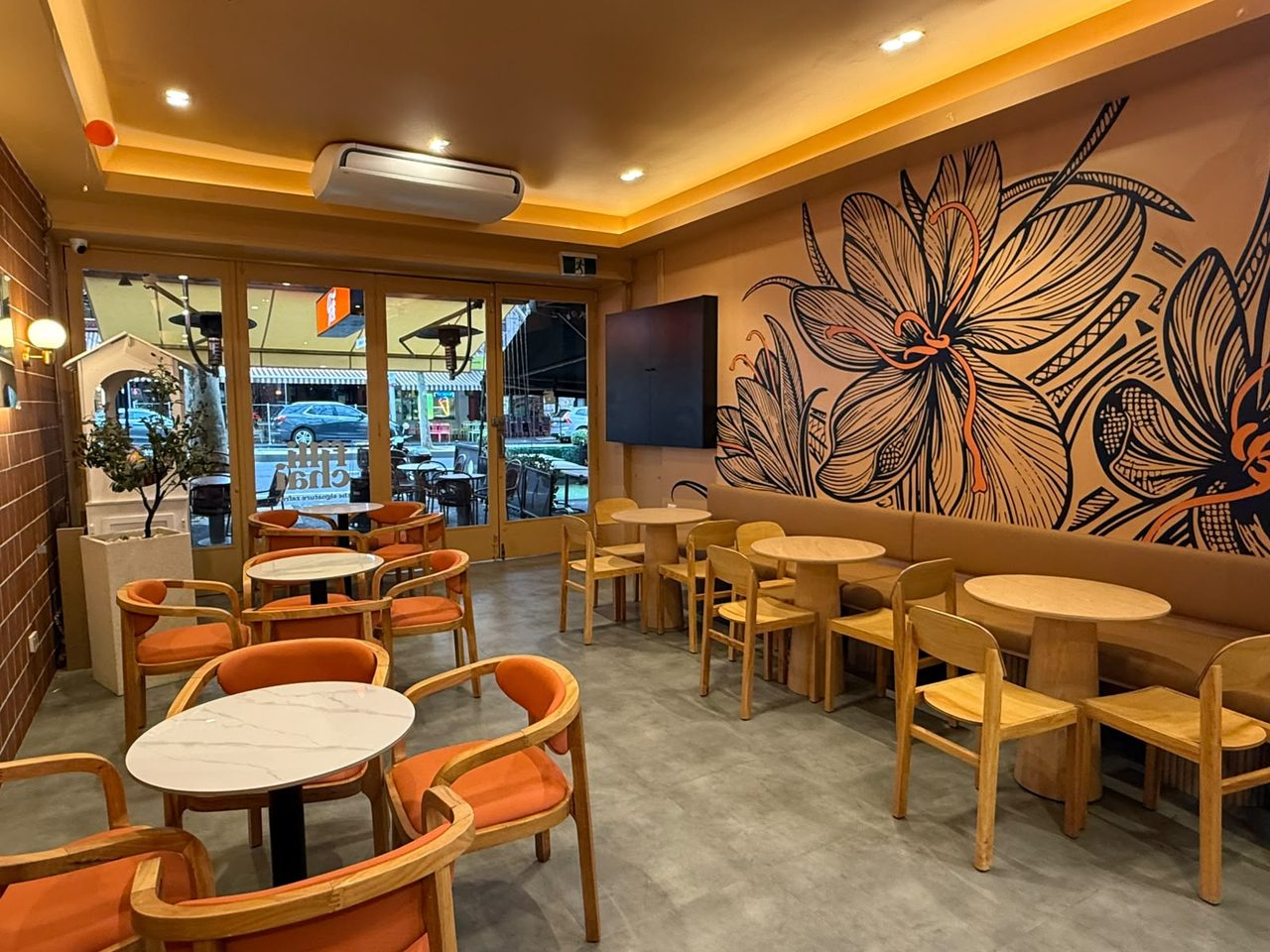 FiLLi Cafe Carlton interior with saffron flower mural