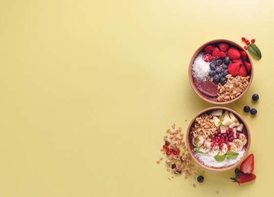 Fresh acai bowls with berries and granola