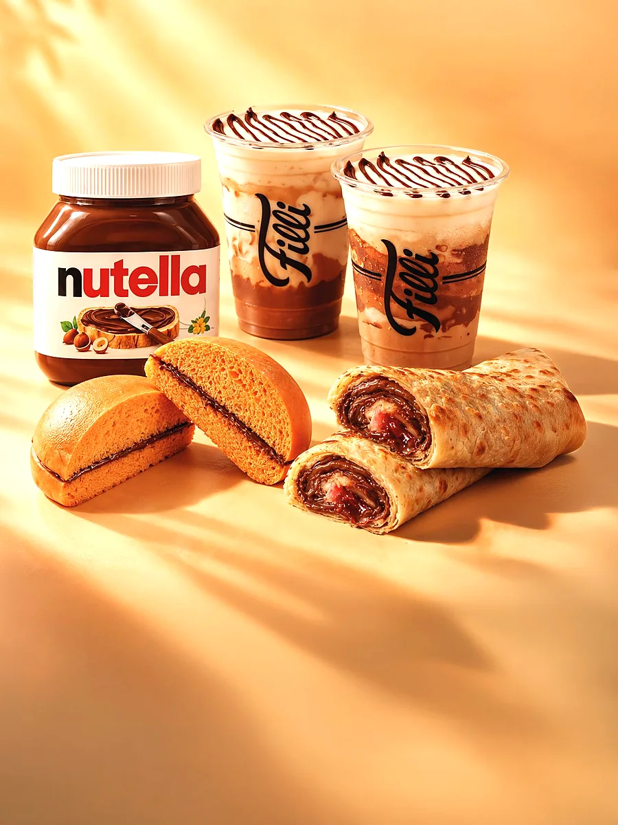 FiLLi meets Nutella: FiLLi Bun, Paratha Roll and two iced drinks prepared with Nutella, beside a Nutella jar